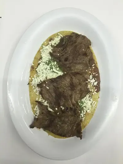 Tacos de bisteck con queso